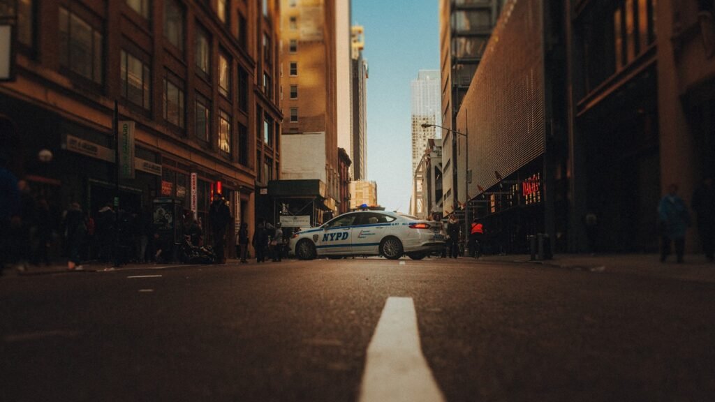 cars parked on side of the road during daytime