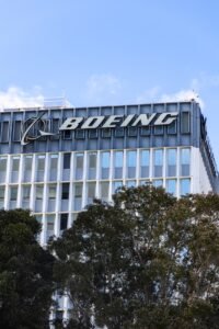 a tall building with a sign on top of it