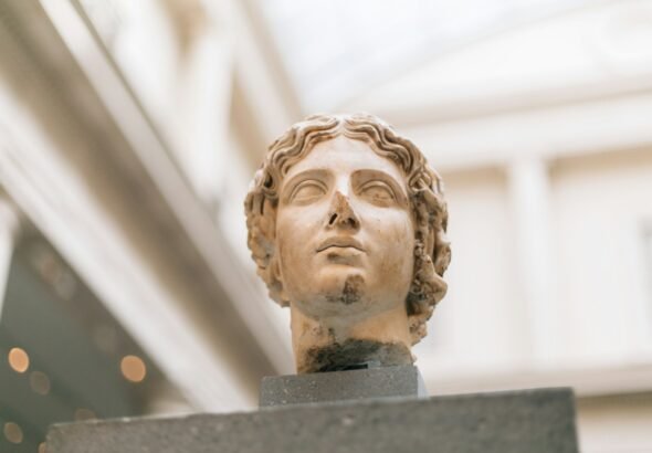 Art Industry: From a $227,500 Slot Machine to a Donkey Painting for Charity and Hot Dogs Rewriting History — This Week’s Art World Is Wild, Weird, and Wonderful 7 male Grecian bust inside museum, art, art news, museums, museum