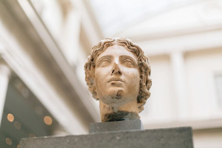 Art Industry: From a $227,500 Slot Machine to a Donkey Painting for Charity and Hot Dogs Rewriting History — This Week’s Art World Is Wild, Weird, and Wonderful 3 male Grecian bust inside museum, art, art news, museums, museum