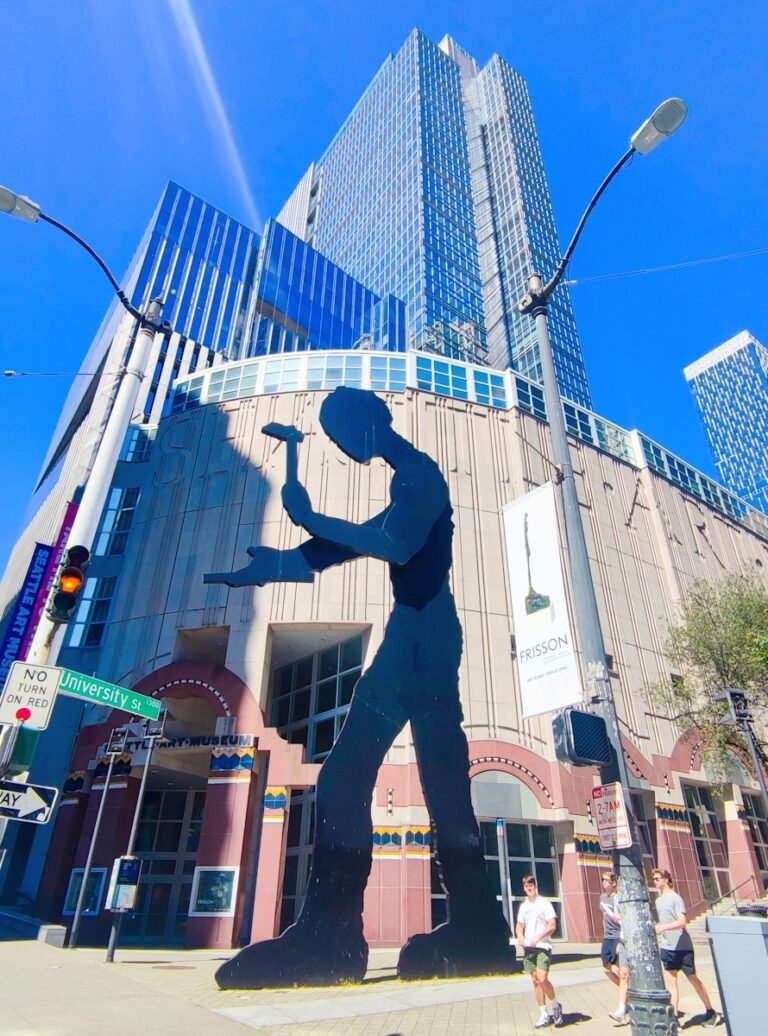 a large building with a large blue and white figure on it