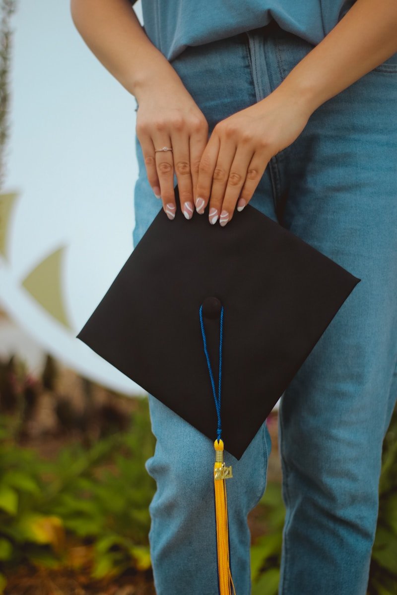 Supreme Court Ruling on Race-Based Admissions: Impact on College Diversity Still Unclear 1 person in blue denim jeans holding black paper bag