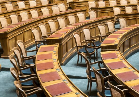 brown wooden chairs on blue and brown wooden floor