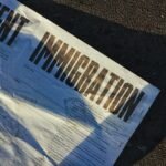 white printed paper, ICE, Immigration, court,
