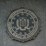 the seal of the department of justice on a wall