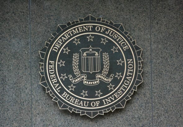 the seal of the department of justice on a wall