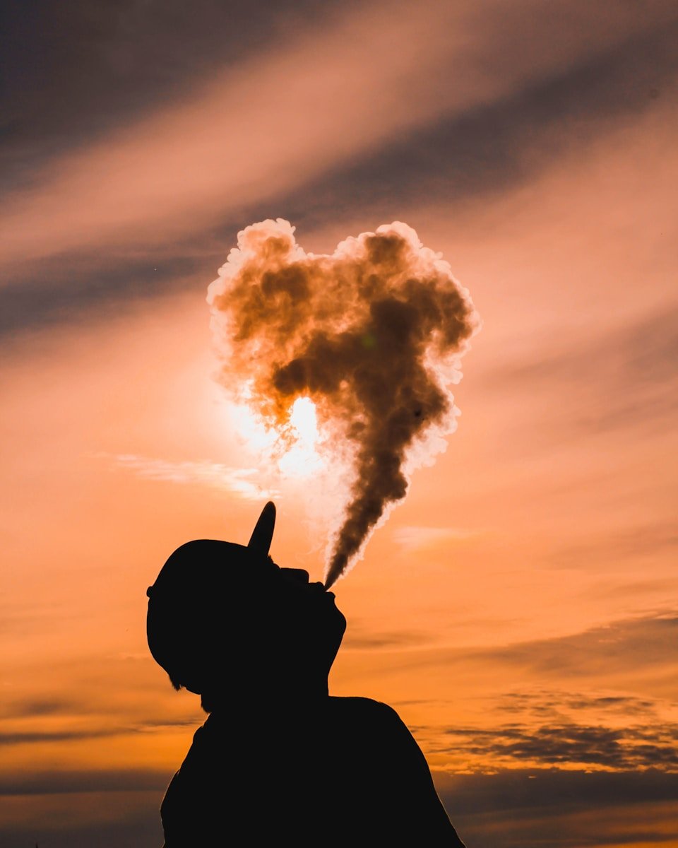 Minnesota AG Ellison Wins Court Order Banning Vape Products Disguised as Highlighters 1 silhouette of man vaping during sunset