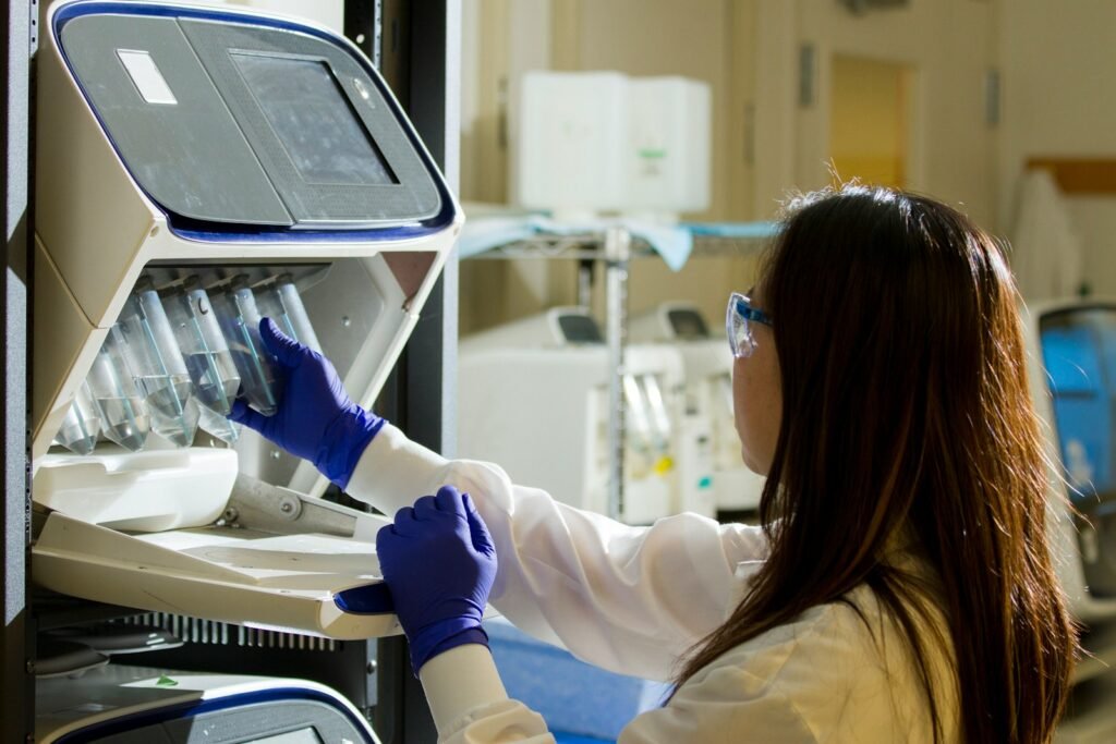 Hawai‘i Leads Multistate Lawsuit to Block Cuts to NSF Programs, Protect Scientific Research and Diversity in STEM 1 woman in white long sleeve shirt wearing blue gloves