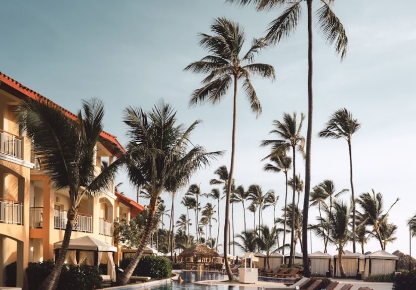 From Marilyn’s timeless reinvention to Beaches’ family-fueled island celebration, two standout experiences invite audiences to see legacy, joy, and self-expression in a new light 34 brown wooden lounge chairs near pool surrounded by palm trees, celebration