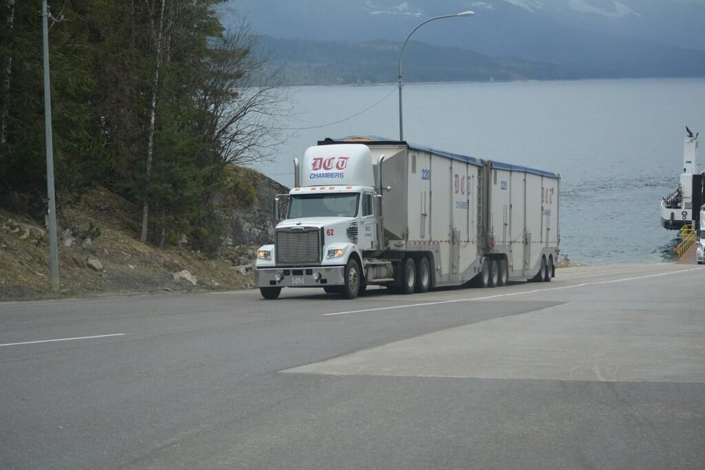 Former Fuel Truck Supply Company Owner Sentenced for Bid Rigging in Federal Wildfire Contracts 1 truck, lorry, white truck, cargo truck, big rig, transportation, vehicle, highway, lake, driving, nature, truck drivers, truckers, lorry driver, gray truck