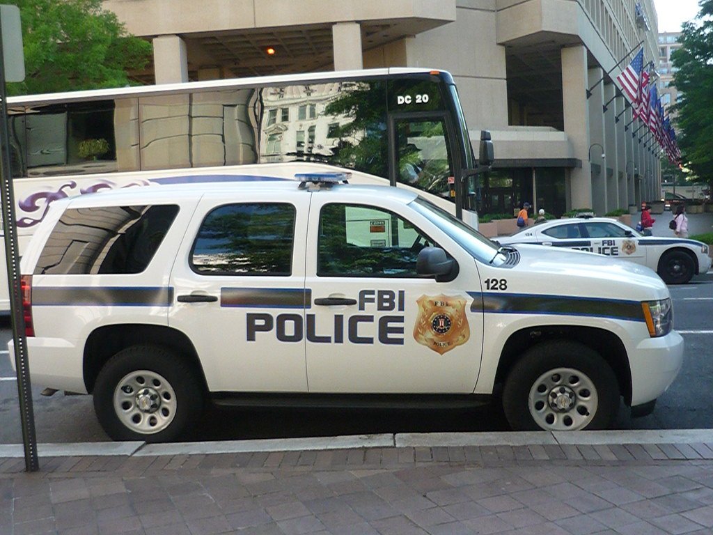 Stolen Paintings Recovered After 40 Years, Returned to Harwood Museum of Art 1 FBI Police Chevy Tahoe
