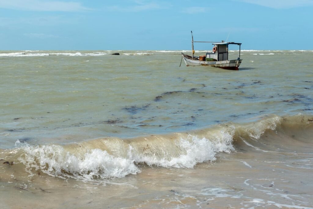 US Military Kills Two in Strike on Suspected Drug Boat in Pacific — First Operation in Region 1 A lone fishing boat floats on the choppy waters off the coast of Arraial d'Ajuda, Bahia, Brazil.
