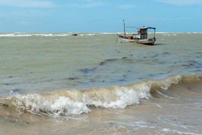 US Military Kills Two in Strike on Suspected Drug Boat in Pacific — First Operation in Region 3 A lone fishing boat floats on the choppy waters off the coast of Arraial d'Ajuda, Bahia, Brazil.