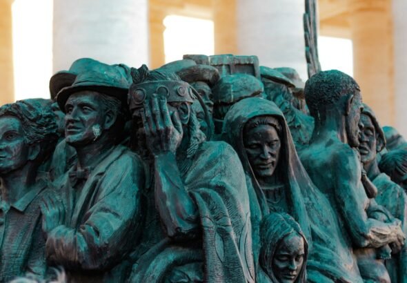 Sculpture of distressed people in a crowd, federal workers, officers, crime, federal, employees